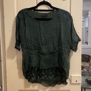 Green silk top with embroidered detail